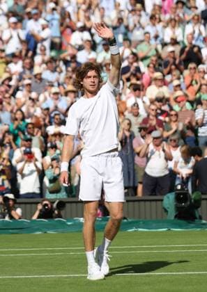 Russian Andrey Rublev celebrates victory in his match against Kazakhstan s Alexander Bublik on day seven of the 2023 Wimbledon championships in London on Sunday, July 9, 2023.  LON2023070950 HUGOxPHILPOTT