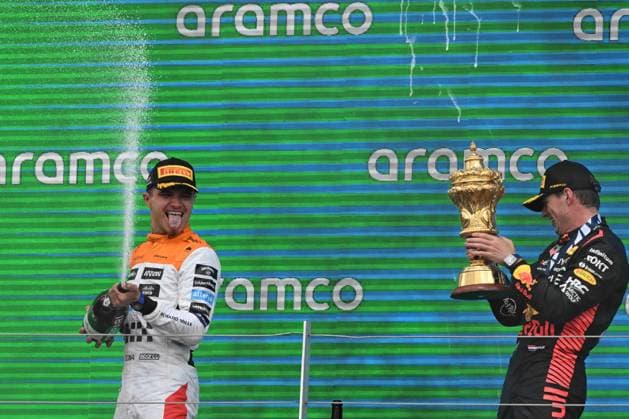 9th July 2023: Silverstone Circuit, Northamptonshire, England: Formula 1 2023 Aramco British F1 Grand Prix: Race Day; Lando Norris of the McLaren-Mercedes team sprays Max Verstappen of the Red Bull Racing team with Champagne  ActionPlus12529316 SimonxWest