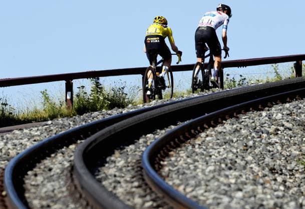Danish Jonas Vingegaard of Jumbo-Visma and Slovenian Tadej Pogacar of UAE Team Emirates pictured in action during stage 9 of the Tour de France cycling race, a 182,4 km race from Saint-Leonard-de-Noblat to Puy de Dome, France, Sunday 09 July 2023. This year s Tour de France takes place from 01 to 23 July 2023. POOLxETIENNExGARNIER  x70375975x