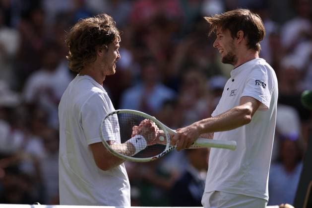 9th July 2023; All England Lawn Tennis and Croquet Club, London, England: Wimbledon Tennis Tournament; Andrey Rublev shakes hands with Alexander Bublik after he wins the match  ActionPlus12529327 ShaunxBrooks