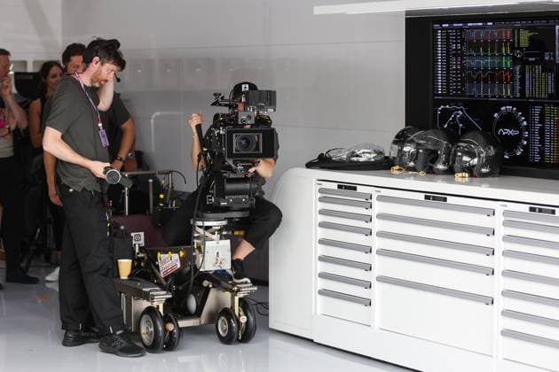 Film camera APEX APXGP Team crew filming in the garage for the F1 movie by Apple Studios Bruckheimer Films during the 2023 Formula 1 Aramco British Grand Prix, 10th round of the 2023 Formula One World Championship, WM, Weltmeisterschaft from July 7 to 9, 2023 on the Silverstone Circuit, in Silverstone, United Kingdom - F1 - BRITISH GRAND PRIX 2023 - RACE DPPI Panoramic  00123025_AV6_7872 