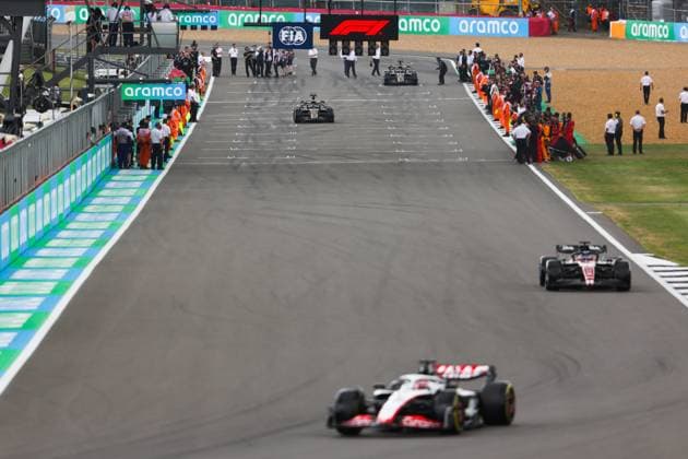 The two modified F2 cars of the fictional drivers Joshua Pearce and Sonny Hayes for the Apex APXGP team in the upcoming F1 movie by Apple Studios Bruckheimer Films, action taking the start of the formation lap at the back of the grid during the 2023 Formula 1 Aramco British Grand Prix, 10th round of the 2023 Formula One World Championship, WM, Weltmeisterschaft from July 7 to 9, 2023 on the Silverstone Circuit, in Silverstone, United Kingdom - F1 - BRITISH GRAND PRIX 2023 - RACE DPPI Panoramic  00123025_AV3_8563 