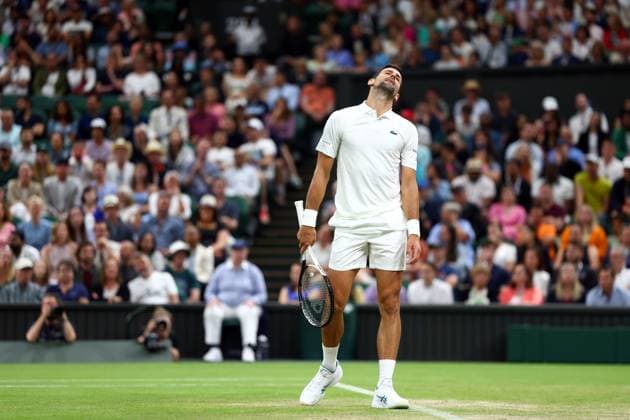 Mandatory Credit: Photo by Simon Dael Shutterstock (14003009gm) Novak Djokovic dejected during his fourth round match Wimbledon Tennis Championships, Day 7, The All England Lawn Tennis and Croquet Club, London, UK - 09 Jul 2023 Wimbledon Tennis Championships, Day 7, The All England Lawn Tennis and Croquet Club, London, UK - 09 Jul 2023  Copyright: xSimonxDael Shutterstockx 14003009gm