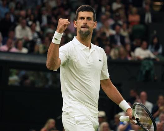 Tennis - 2023 Wimbledon Championships - Week One - Day Seven - All England lawn Tennis & Racquet Club, Wimbledon - Sunday 9th Mens singles - Hubert Hurkacz (POL) v Novak Djokovic (SRB) Novak Djokovic shakes his fist at the crowd after winning the first set 