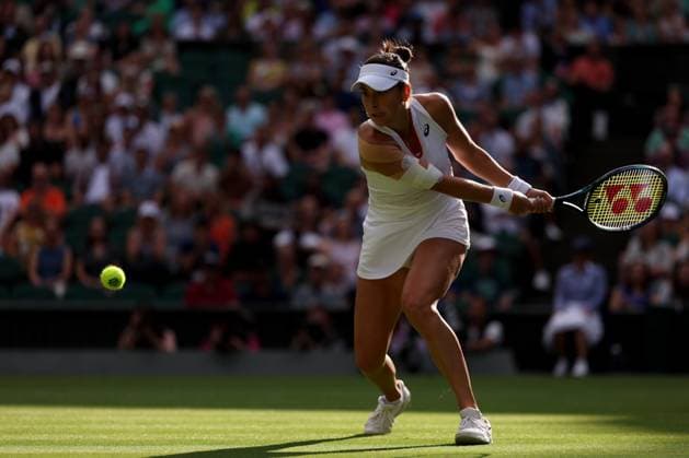 9th July 2023; All England Lawn Tennis and Croquet Club, London, England: Wimbledon Tennis Tournament; Belinda Bencic during her match with Iga Swiatek  ActionPlus12529547 ShaunxBrooks