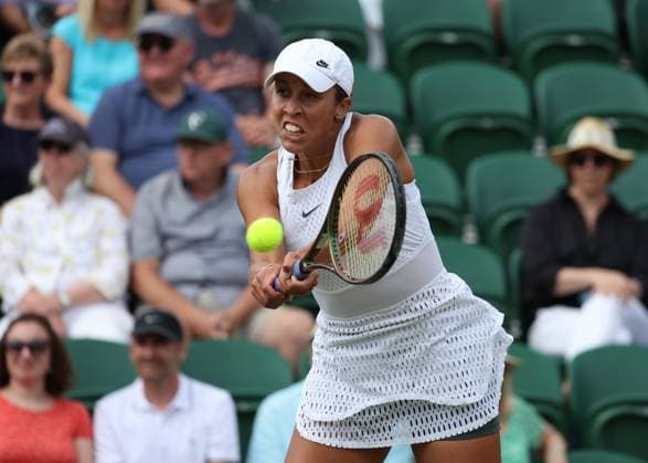 10th July 2023; All England Lawn Tennis and Croquet Club, London, England: Wimbledon Tennis Tournament; Madison Keys (USA) with a backhand shot to Mirra Andreeva (RUS) in womens singles match  ActionPlus12529744 JohnxPatrickxFletcher