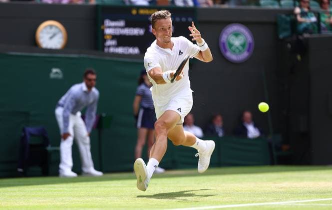 Mandatory Credit: Photo by Simon Dael Shutterstock (14003752af) Jiri Lehecka in action against Daniil Medvedev Wimbledon Tennis Championships, Day 8, The All England Lawn Tennis and Croquet Club, London, UK - 10 Jul 2023 Wimbledon Tennis Championships, Day 8, The All England Lawn Tennis and Croquet Club, London, UK - 10 Jul 2023  Copyright: xSimonxDael Shutterstockx 14003752af