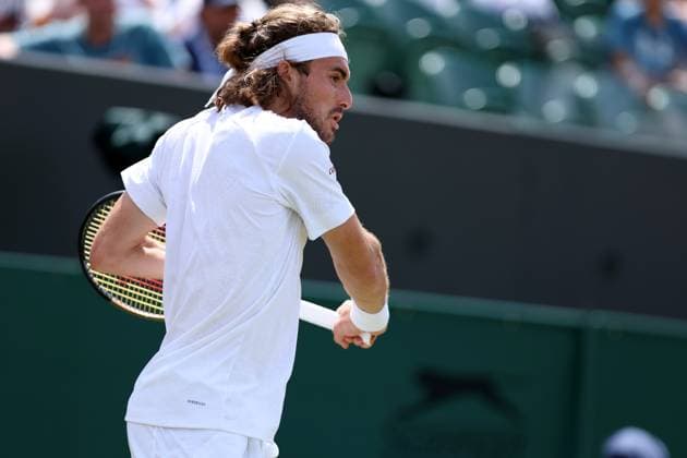 10th July 2023; All England Lawn Tennis and Croquet Club, London, England: Wimbledon Tennis Tournament; Stefanos Tsitsipas plays a backhand shot to Christopher Eubanks, mens singles  ActionPlus12529764 ShaunxBrooks