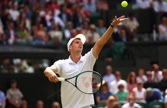 Mandatory Credit: Photo by Ella Ling Shutterstock (14003751ab) Hubert Hurkacz in action against Novak Djokovic Wimbledon Tennis Championships, Day 8, The All England Lawn Tennis and Croquet Club, London, UK - 10 Jul 2023 Wimbledon Tennis Championships, Day 8, The All England Lawn Tennis and Croquet Club, London, UK - 10 Jul 2023  Copyright: xEllaxLing Shutterstockx 14003751ab