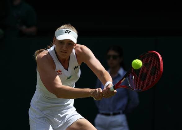 10th July 2023; All England Lawn Tennis and Croquet Club, London, England: Wimbledon Tennis Tournament; Elena Rybakina (KAZ) with a backhand shot to Beatriz Haddad Maia (BRA)  ActionPlus12529830 JohnxPatrickxFletcher
