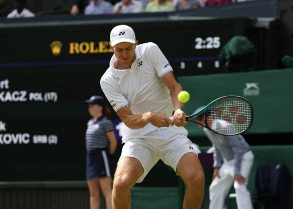 10th July 2023; All England Lawn Tennis and Croquet Club, London, England: Wimbledon Tennis Tournament; Hubert Hurkacz (POL) with a backhand shot to Novak Djokovic (SRB)  ActionPlus12529862 JohnxPatrickxFletcher