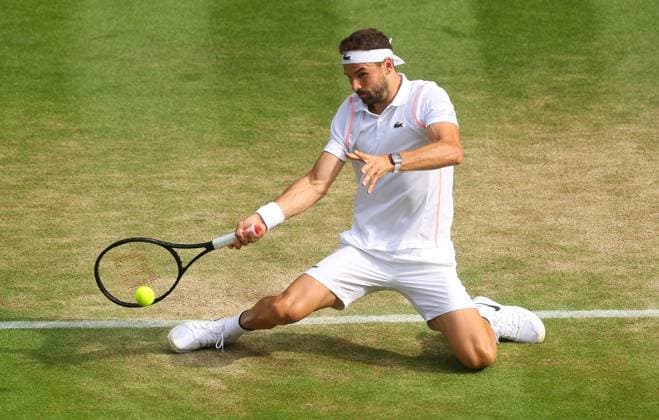 Mandatory Credit: Photo by Ella Ling Shutterstock (14003751dn) Grigor Dimitrov in action again Holger Rune Wimbledon Tennis Championships, Day 8, The All England Lawn Tennis and Croquet Club, London, UK - 10 Jul 2023 Wimbledon Tennis Championships, Day 8, The All England Lawn Tennis and Croquet Club, London, UK - 10 Jul 2023  Copyright: xEllaxLing Shutterstockx 14003751dn