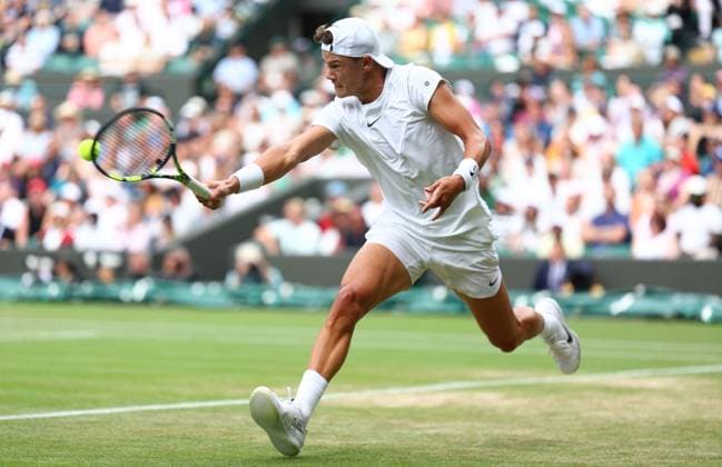 Mandatory Credit: Photo by Simon Dael Shutterstock (14003752cu) Holger Rune in action against Grigor Dimitrov Wimbledon Tennis Championships, Day 8, The All England Lawn Tennis and Croquet Club, London, UK - 10 Jul 2023 Wimbledon Tennis Championships, Day 8, The All England Lawn Tennis and Croquet Club, London, UK - 10 Jul 2023  Copyright: xSimonxDael Shutterstockx 14003752cu