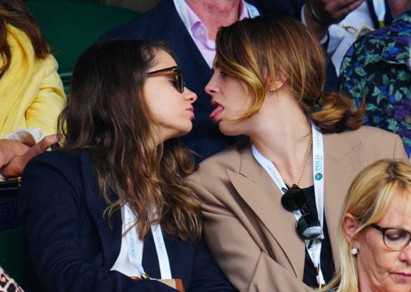 Mandatory Credit: Photo by Javier Garcia Shutterstock (14003748hs) Cara Delevingne kissing girlfriend Minke in the crowd on Centre Court Wimbledon Tennis Championships, Day 8, The All England Lawn Tennis and Croquet Club, London, UK - 10 Jul 2023 Wimbledon Tennis Championships, Day 8, The All England Lawn Tennis and Croquet Club, London, UK - 10 Jul 2023  Copyright: xJavierxGarcia Shutterstockx 14003748hs