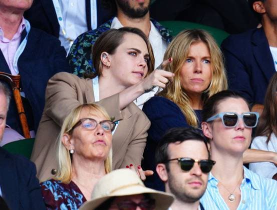 Mandatory Credit: Photo by Javier Garcia Shutterstock (14003748id) Cara Delevingne and Sienna Miller in the crowd on Centre Court Wimbledon Tennis Championships, Day 8, The All England Lawn Tennis and Croquet Club, London, UK - 10 Jul 2023 Wimbledon Tennis Championships, Day 8, The All England Lawn Tennis and Croquet Club, London, UK - 10 Jul 2023  Copyright: xJavierxGarcia Shutterstockx 14003748id