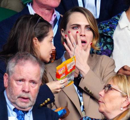 Mandatory Credit: Photo by Javier Garcia Shutterstock (14003748if) Cara Delevingne and girlfriend Minke are handed sweets in the crowd on Centre Court Wimbledon Tennis Championships, Day 8, The All England Lawn Tennis and Croquet Club, London, UK - 10 Jul 2023 Wimbledon Tennis Championships, Day 8, The All England Lawn Tennis and Croquet Club, London, UK - 10 Jul 2023  Copyright: xJavierxGarcia Shutterstockx 14003748if
