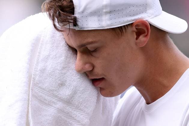 10th July 2023; All England Lawn Tennis and Croquet Club, London, England: Wimbledon Tennis Tournament; Holger Rune during his match with Grigor Dimitrov  ActionPlus12529981 ShaunxBrooks