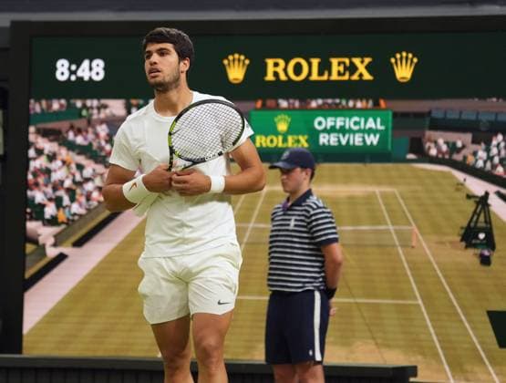 Tennis - 2023 Wimbledon Championships - Week Two - Day Eight - All England lawn Tennis & Racquet Club, Wimbledon - Monday 10th Mens singles - Carlos Alcaraz (ESP) v Matteo Berrettini (ITA) Carlos Alcaraz watches the replay on the screen 