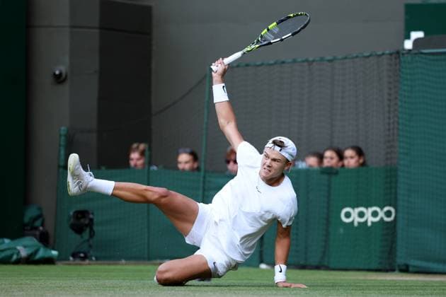 Sport Themen der Woche KW28 Sport Bilder des Tages 10th July 2023; All England Lawn Tennis and Croquet Club, London, England: Wimbledon Tennis Tournament; Holger Rune slips during his match with Grigor Dimitrov  ActionPlus12530004 ShaunxBrooks