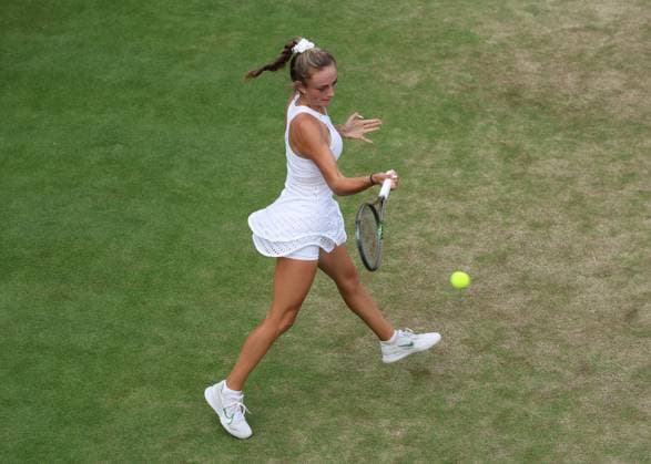10th July 2023; All England Lawn Tennis and Croquet Club, London, England: Wimbledon Tennis Tournament; Isabelle Lacy (GBR) with a forehand shot to Clervie Ngounoue (USA)  ActionPlus12530045 JohnxPatrickxFletcher