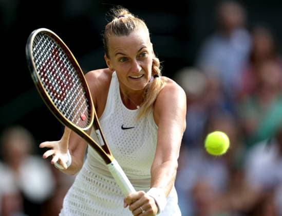 (230711) -- LONDON, July 11, 2023 -- Petra Kvitova competes during the women s singles fourth round match between Ons Jabeur of Tunisia and Petra Kvitova of the Czech Republic at Wimbledon tennis Championship in London, Britain, on July 10, 2023. ) (SP)BRITAIN-LONDON-TENNIS-WIMBLEDON-DAY 8 LixYing 