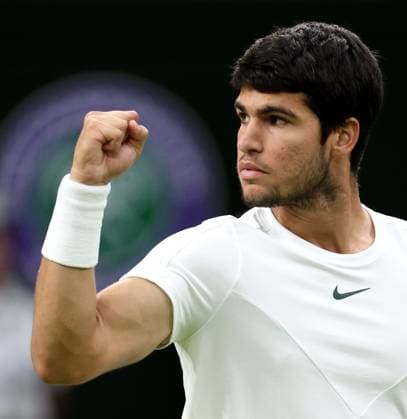 (230711) -- LONDON, July 11, 2023 -- Carlos Alcaraz reacts during the men s singles fourth round match between Carlos Alcaraz of Spain and Matteo Berrettini of Italy at Wimbledon tennis Championship in London, Britain, on July 10, 2023. ) (SP)BRITAIN-LONDON-TENNIS-WIMBLEDON-DAY 8 LixYing 