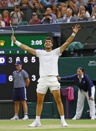 Tennis: Wimbledon championships Carlos Alcaraz of Spain celebrates after beating Matteo Berrettini of Italy in the men s singles fourth round at the Wimbledon tennis tournament in London on July 10, 2023.  A14AA0001669962P  