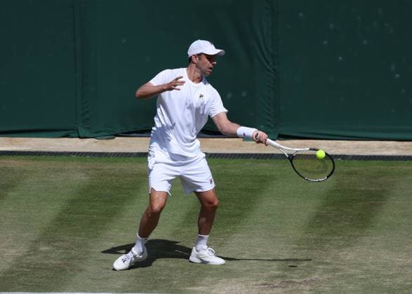 11th July 2023; All England Lawn Tennis and Croquet Club, London, England: Wimbledon Tennis Tournament; Horacio Zeballos (ARG) with a forehand shot to Marcel Granollers (ESP) mens doubles round of 16  ActionPlus12530053 JohnxPatrickxFletcher