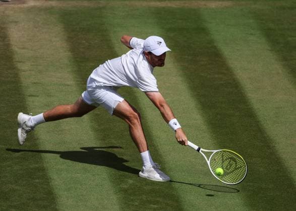 11th July 2023; All England Lawn Tennis and Croquet Club, London, England: Wimbledon Tennis Tournament; Robert Galloway (USA) with a backhand shot to Marcel Granollers (ESP) mens doubles round of 16  ActionPlus12530074 JohnxPatrickxFletcher