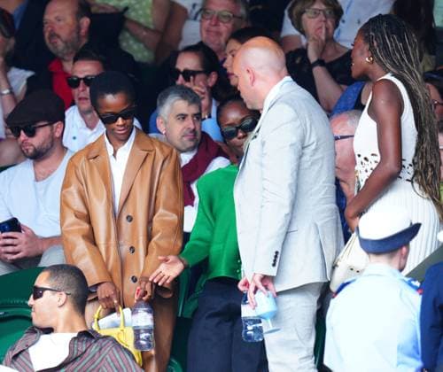 Mandatory Credit: Photo by Javier Garcia Shutterstock (14003753av) Letitia Wright, Tom Allen and AJ Odudu watching the action on Centre Court Wimbledon Tennis Championships, Day 9, The All England Lawn Tennis and Croquet Club, London, UK - 11 Jul 2023 Wimbledon Tennis Championships, Day 9, The All England Lawn Tennis and Croquet Club, London, UK - 11 Jul 2023  Copyright: xJavierxGarcia Shutterstockx 14003753av
