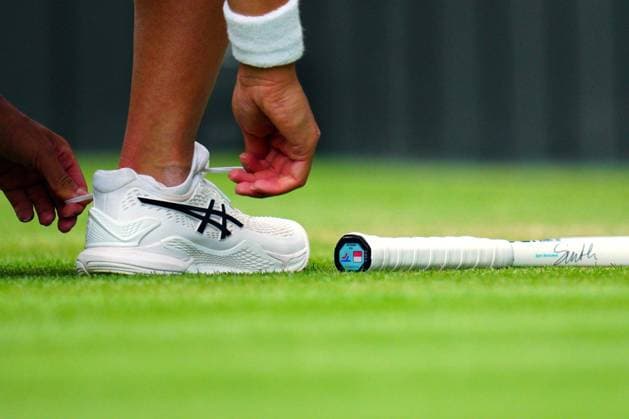 Mandatory Credit: Photo by Javier Garcia Shutterstock (14003753bs) The Ascis tennis shoes of Iga Swiatek Wimbledon Tennis Championships, Day 9, The All England Lawn Tennis and Croquet Club, London, UK - 11 Jul 2023 Wimbledon Tennis Championships, Day 9, The All England Lawn Tennis and Croquet Club, London, UK - 11 Jul 2023  Copyright: xJavierxGarcia Shutterstockx 14003753bs