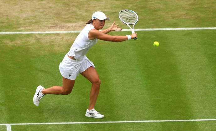Mandatory Credit: Photo by Ella Ling Shutterstock (14003758e) Iga Swiatek in action against Elina Svitolina Wimbledon Tennis Championships, Day 9, The All England Lawn Tennis and Croquet Club, London, UK - 11 Jul 2023 Wimbledon Tennis Championships, Day 9, The All England Lawn Tennis and Croquet Club, London, UK - 11 Jul 2023  Copyright: xEllaxLing Shutterstockx 14003758e