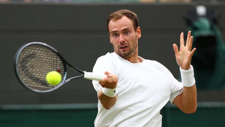 Mandatory Credit: Photo by Simon Dael Shutterstock (14003756cp) Roman Safiullin in action against Jannik Sinner Wimbledon Tennis Championships, Day 9, The All England Lawn Tennis and Croquet Club, London, UK - 11 Jul 2023 Wimbledon Tennis Championships, Day 9, The All England Lawn Tennis and Croquet Club, London, UK - 11 Jul 2023  Copyright: xSimonxDael Shutterstockx 14003756cp