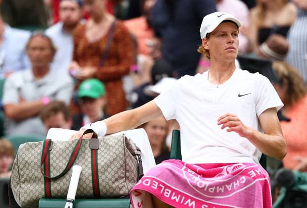 Mandatory Credit: Photo by Simon Dael Shutterstock (14003756cw) Jannik Sinner goes into a Gucci bag during their quarter final against Roman Safiullin Wimbledon Tennis Championships, Day 9, The All England Lawn Tennis and Croquet Club, London, UK - 11 Jul 2023 Wimbledon Tennis Championships, Day 9, The All England Lawn Tennis and Croquet Club, London, UK - 11 Jul 2023  Copyright: xSimonxDael Shutterstockx 14003756cw