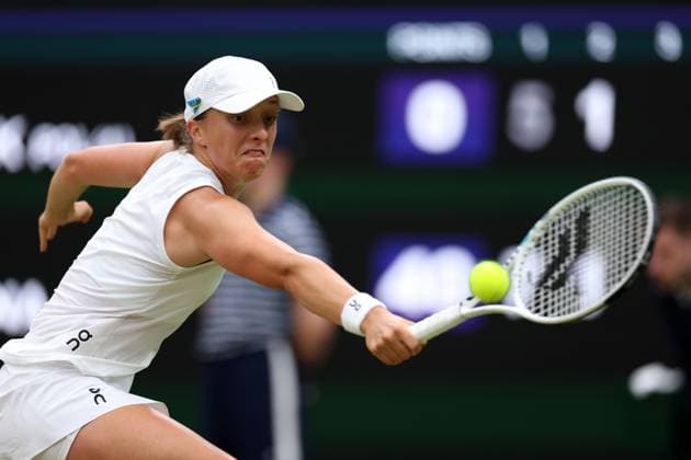 11th July 2023; All England Lawn Tennis and Croquet Club, London, England: Wimbledon Tennis Tournament; Iga Swiatek returns the serve from Elina Svitolina in the womens singles quarter-final match  ActionPlus12530236 ShaunxBrooks