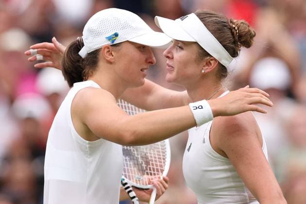 11th July 2023; All England Lawn Tennis and Croquet Club, London, England: Wimbledon Tennis Tournament; Elina Svitolina embraces Iga Swiatek after she wins the match in the womens singles quarter-final match  ActionPlus12530214 ShaunxBrooks