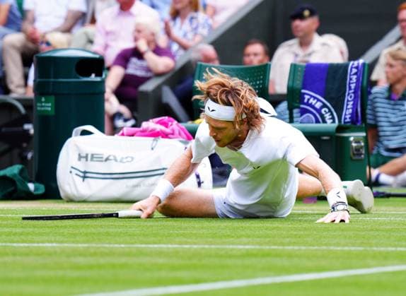 Mandatory Credit: Photo by Javier Garcia Shutterstock (14003753ir) Andrey Rublev falls during his quarter final match Wimbledon Tennis Championships, Day 9, The All England Lawn Tennis and Croquet Club, London, UK - 11 Jul 2023 Wimbledon Tennis Championships, Day 9, The All England Lawn Tennis and Croquet Club, London, UK - 11 Jul 2023  Copyright: xJavierxGarcia Shutterstockx 14003753ir