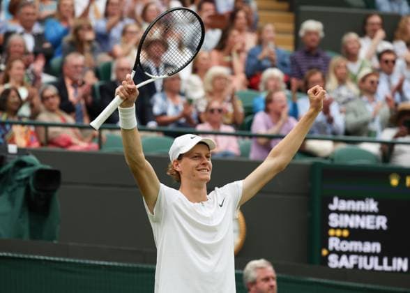 11th July 2023; All England Lawn Tennis and Croquet Club, London, England: Wimbledon Tennis Tournament; Jannik Sinner (ITA) celebrates towards his coaches after defeating Roman Safiullin (RUS) by three sets to one to reach the semi finals  ActionPlus12530286 JohnxPatrickxFletcher