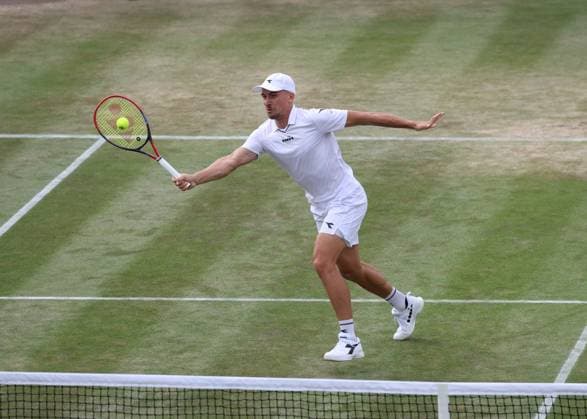 11th July 2023; All England Lawn Tennis and Croquet Club, London, England: Wimbledon Tennis Tournament; Jan Zielinski (POL) with a forehand shot to Jamie Murray (GBR)  ActionPlus12530310 JohnxPatrickxFletcher