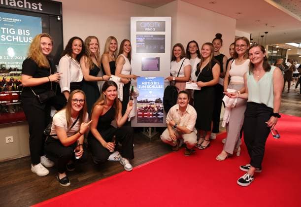 11 07 2023 football season 2022 2023 2 women football Bundesliga cinema premiere 1 FC Nuremberg FCN club promotion film brave to the end sports photo zinc DaMa xdaxmax parts not complete of the team promotion team of FCN in front of cinema poster