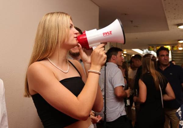 11 07 2023 football season 2022 2023 2 women football Bundesliga cinema premiere 1 FC Nuremberg FCN club promotion film brave to the end sports photo zinc DaMa xdaxmax club fan club fans FCN fans are asked with megaphone to go to the cinema hall