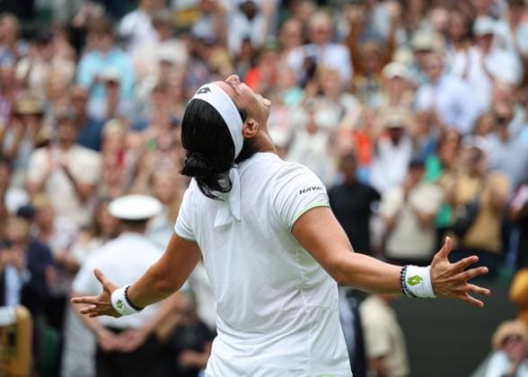 12th July 2023; All England Lawn Tennis and Croquet Club, London, England: Wimbledon Tennis Tournament; Ons Jabeur (TUN) celebrates after defeating the defending champion Elena Rybakina (KAZ) by two sets to one  ActionPlus12530689 JohnxPatrickxFletcher
