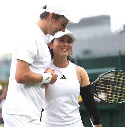 (230712) -- LONDON, July 12, 2023 -- Xu Yifan (R) Joran Vliegen celebrate after winning the mixed doubles semifinal match between Xu Yifan (China) Joran Vliegen (Belgium) and Matwe Middelkoop (the Netherlands) Aldila Sutjiadi (Indonesia) at Wimbledon tennis Championship in London, Britain, July 12, 2023. ) (SP)BRITAIN-LONDON-TENNIS-WIMBLEDON LixYing 