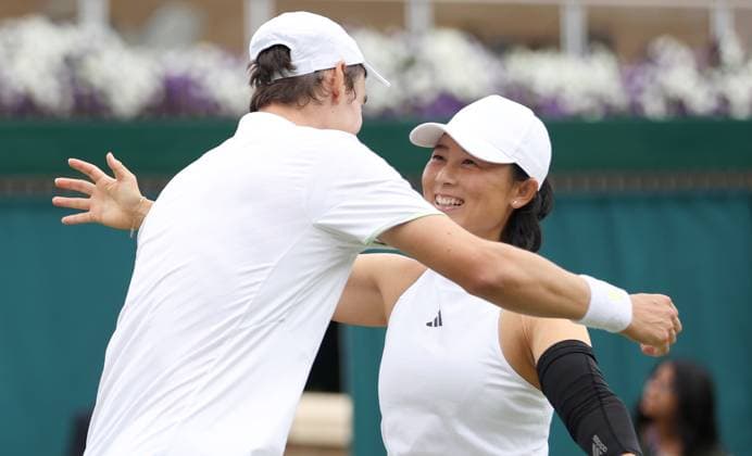 (230712) -- LONDON, July 12, 2023 -- Xu Yifan (R) Joran Vliegen celebrate after winning the mixed doubles semifinal match between Xu Yifan (China) Joran Vliegen (Belgium) and Matwe Middelkoop (the Netherlands) Aldila Sutjiadi (Indonesia) at Wimbledon tennis Championship in London, Britain, July 12, 2023. ) (SP)BRITAIN-LONDON-TENNIS-WIMBLEDON LixYing 