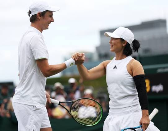 (230712) -- LONDON, July 12, 2023 -- Xu Yifan (R) Joran Vliegen celebrate after winning the mixed doubles semifinal match between Xu Yifan (China) Joran Vliegen (Belgium) and Matwe Middelkoop (the Netherlands) Aldila Sutjiadi (Indonesia) at Wimbledon tennis Championship in London, Britain, July 12, 2023. ) (SP)BRITAIN-LONDON-TENNIS-WIMBLEDON LixYing 