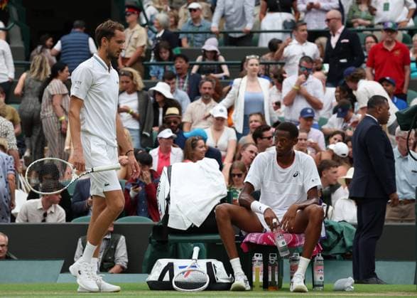 12th July 2023; All England Lawn Tennis and Croquet Club, London, England: Wimbledon Tennis Tournament; Daniil& xa0;Medvedev (RUS) walks past Christopher& xa0;Eubanks (USA) during a break in play  ActionPlus12530785 JohnxPatrickxFletcher
