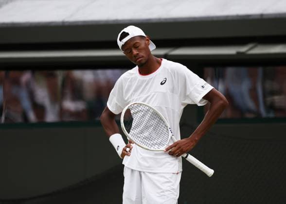 12th July 2023; All England Lawn Tennis and Croquet Club, London, England: Wimbledon Tennis Tournament; Christopher& xa0;Eubanks (USA) reacts disspointed after his shot to Daniil& xa0;Medvedev (RUS) hits the net  ActionPlus12530786 JohnxPatrickxFletcher