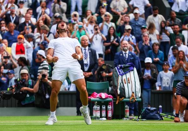 Mandatory Credit: Photo by Ella Ling Shutterstock (14006838cr) Carlos Alcaraz celebrates beating Holger Rune Wimbledon Tennis Championships, Day 10, The All England Lawn Tennis and Croquet Club, London, UK - 12 Jul 2023 Wimbledon Tennis Championships, Day 10, The All England Lawn Tennis and Croquet Club, London, UK - 12 Jul 2023  Copyright: xEllaxLing Shutterstockx 14006838cr