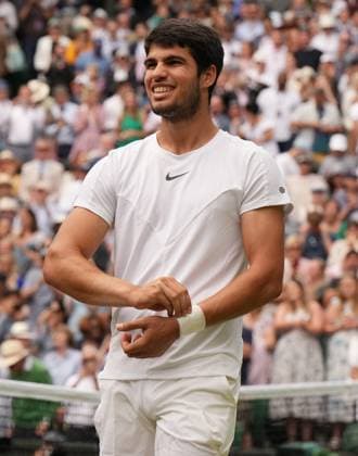 Tennis - 2023 Wimbledon Championships - Week Two - Day Ten - All England lawn Tennis & Racquet Club, Wimbledon - Wednesday 12th Mens singles - Carlos Alcaraz (ESP) v Holger Rune (DEN) Carlos Alcaraz after victory 