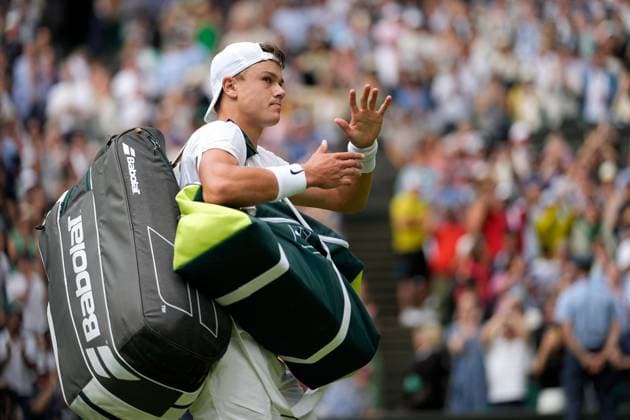 Mandatory Credit: Photo by Dave Shopland Shutterstock (14006841ei) Holger Rune after defeat in his quarter final match Wimbledon Tennis Championships, Day 10, The All England Lawn Tennis and Croquet Club, London, UK - 12 Jul 2023 Wimbledon Tennis Championships, Day 10, The All England Lawn Tennis and Croquet Club, London, UK - 12 Jul 2023  Copyright: xDavexShopland Shutterstockx 14006841ei